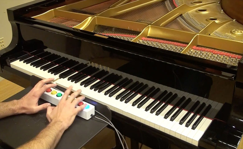 谷歌开发AI系统Piano Genie，按几个按钮就能即兴创作音乐