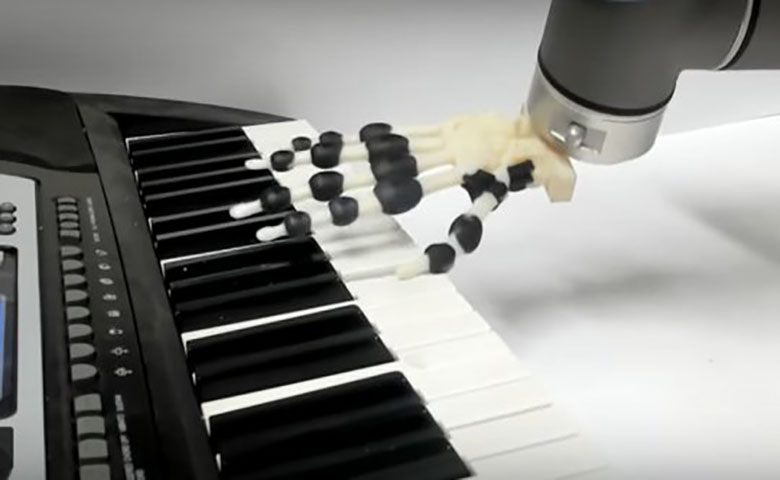 3D打印机器人手，进行不同风格的钢琴演奏